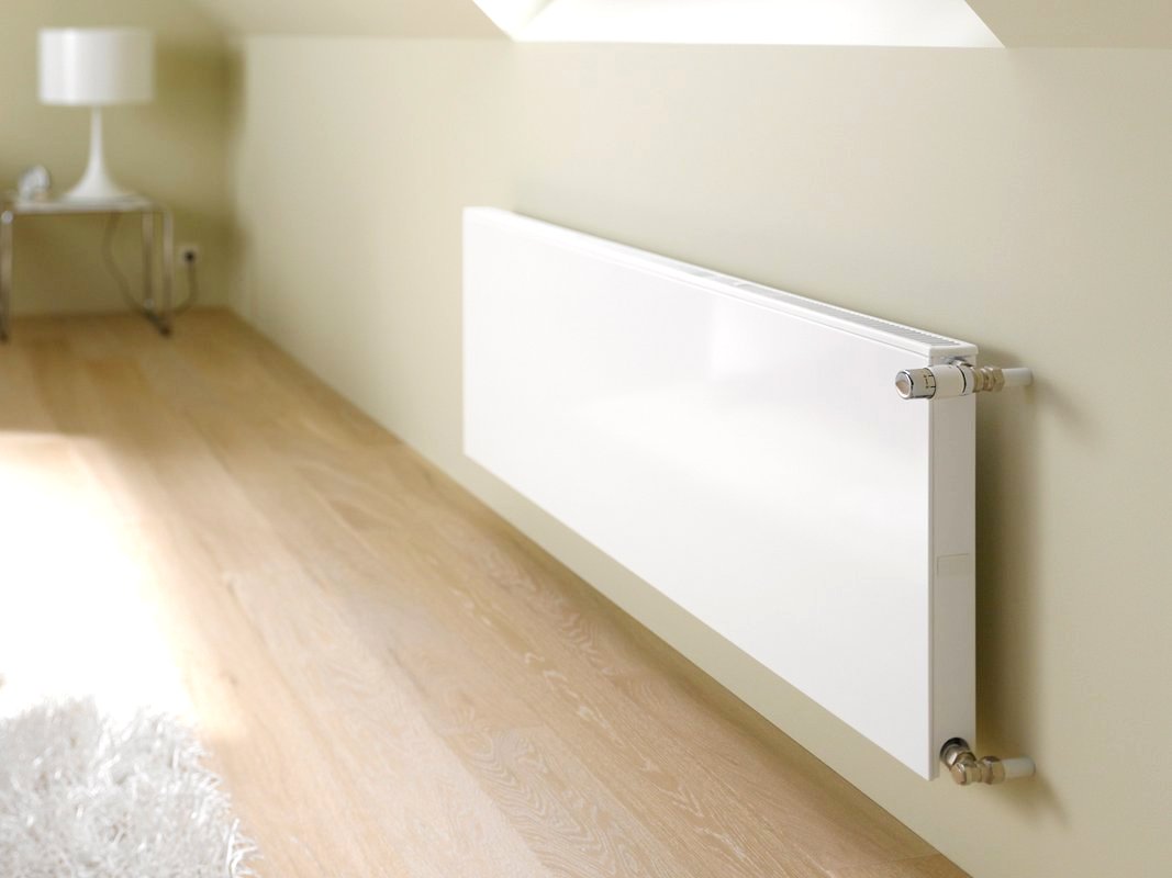 Kermi Therm X2 Plan-K Тип 12 PKO 66.305.505. Радиатор гладкий ,  высота - 305, длина - 505, глубина - 66. Подключение - Боковое. Сторона подключения - правая. Без термовентиля. Ral 9016. Тепловая мощность 405 Вт